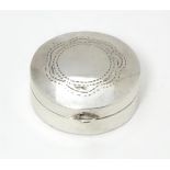 A .925 silver pill box of circular form. Approx. 1 1/8" diameter Please Note - we do not make