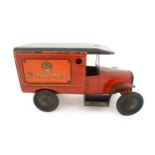Toy: An early 20thC Triangtois / Triang wooden Royal Mail Ford van, painted red with black and
