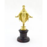 A late 19th / early 20thC Continental gilt bronze sculpture depicting an allegorical figure,