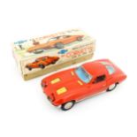 Toy: A 20thC boxed Ichida scale model tinplate battery powered red Chevrolet Corvette Sting Ray