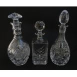 Three various cut crystal / glass decanters. The tallest approx 12 1/4" high (2) Please Note - we do