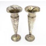 A pair of silver bud vases hallmarked Birmingham 1905 maker Elkington & Co Ltd 5 3/4" high (2)