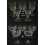 Five cut glass champagne coupes together with five cut glass pedestal wine glasses. Approx 4 1/2"