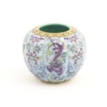 A Chinese famille rose brush wash pot of lobed form decorated with flowers and stylised dragons