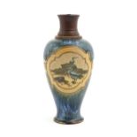 A Doulton Lambeth Florence Barlow stoneware lamp base of vase form, the mottled blue ground