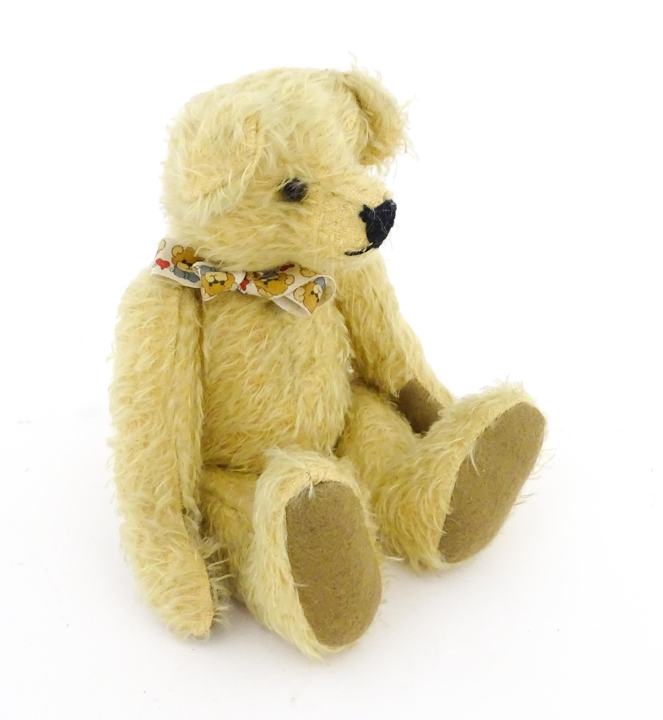 Toy: A 20thC mohair teddy bear with stitched nose and mouth, pad paws, and articulated head and - Image 2 of 7