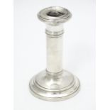 A silver candlestick hallmarked Birmingham 1918. Approx. 4 1/4" high Please Note - we do not make