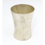 A Queen Elizabeth II Scottish silver beaker of waisted form with textured finish, hallmarked