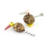 A 20thC novelty corkscrew and novelty cocktail stick holder each modelled as stylised parrots /