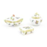 Three items of Herend porcelain decorated in the Queen Victoria pattern comprising two lidded pots