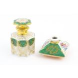 A French porcelain scent / perfume bottle of octagonal form with gilt foliate decoration. Marked