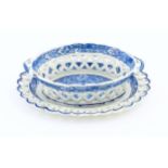 A Spode blue and white twin handled chestnut basket and stand decorated in the Chinoiserie Net