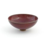 A Chinese sang de boeuf footed bowl. Approx. 2 3/4" high x 6 1/2" diameter Please Note - we do not