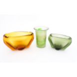 Three items of art glass comprising two Whitefriars vases, and a green glass vase in the manner of