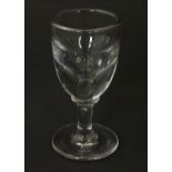 A toast master's glass. Approx. 4" high Please Note - we do not make reference to the condition of