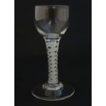 A 19thC pedestal drinking glass with twist detail to stem. Approx 5" high Please Note - we do not