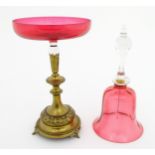 A cranberry clear glass bell together with a glass tazza the base formed as an epergne / centrepiece