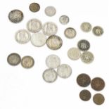Coins: A quantity of assorted coins from Switzerland to include some silver examples (24) Please