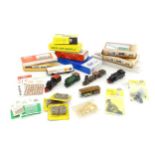 Toys: A quantity of assorted scale model train / railway accessories and building kits to include an