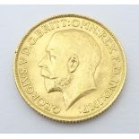 Coin: A George V 1912 gold sovereign coin. Total weight approx. 8g Please Note - we do not make