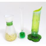 Three items of art glass to include a bud vase and two other vases, one of uranium glass in the