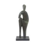 A 20thC cast bronze sculpture depicting a stylised standing figure. In the manner of JD Hansen.