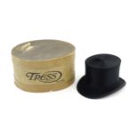 A boxed late 19th / early 20thC silk top hat by Tress, London, with City of London coat of arms to