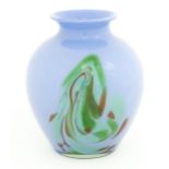 A 20thC art glass vase in the Murano style, the blue body with green brown swirl detail. Approx. 10"