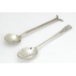 Two Art Deco silver spoons one with engraved geometric decoration to handle , hallmarked Sheffield