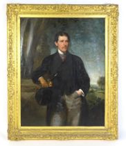 19th century, Oil on canvas, A large portrait of a gentleman in a landscape with riding crop and