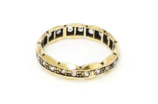 A 9ct gold eternity ring set with white stones. Ring size approx. N. Please Note - we do not make