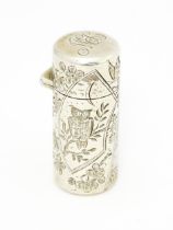 A Victorian silver cased scent bottle with engraved Aesthetic decoration with heron, owl, butterfly,