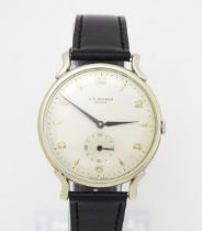 A gentleman's slim manual wind wristwatch with movement by Baume and Mercier, the dial signed for