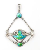 An Art Nouveau silver pendant with enamel decoration, hallmarked Chester 1909, maker Charles Horner.