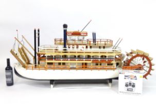 A 20thC scratch built scale model of a 19thC paddle steamer boat , ' Mississippi Swan' , of wooden