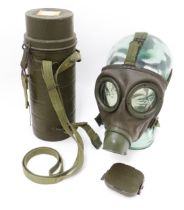Militaria: a post-WWII German Army Bundeswehr M58 gas mask / respirator and case by Auer, the rubber