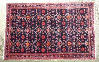 Carpet / Rug : A North west Persian Hamadan rug, the blue ground with repeating floral motifs within