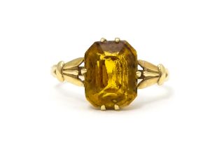 A 9ct gold dress ring set with claw set octagonal cut orange quartz / citrine. Ring size approx. N