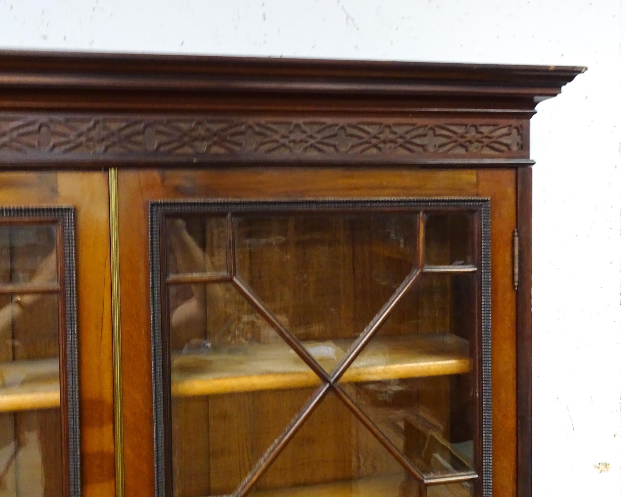 A late 19thC mahogany glazed bookcase by S & H Jewell, Queen Street, London. The cornice with - Image 8 of 9