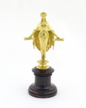 A late 19th / early 20thC Continental gilt bronze sculpture depicting an allegorical figure,