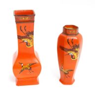 Two Shelley vases, each with an orange ground and flying crane decoration. Pattern no. 8590.