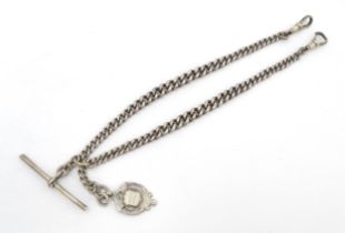 A silver Albert watch chain, with a silver fob hallmarked 1912. Fob approx. 1" long Please Note - we