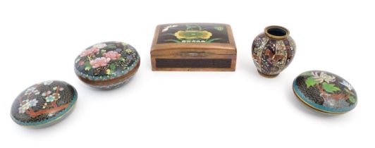Five assorted items of Oriental black ground cloisonne comprising a box of rectangular form with