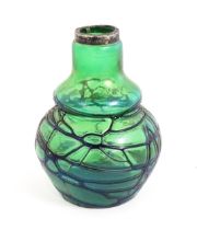 An Art Nouveau green art glass vase with blue iridescent trail detail with silver rim, hallmarked