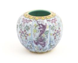 A Chinese famille rose brush wash pot of lobed form decorated with flowers and stylised dragons