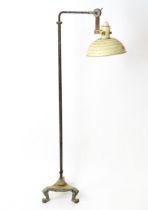 A vintage / industrial adjustable standard lamp on triform base, with shade marked Infrared Pifco