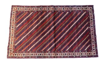 Carpet / Rug : A South west Persian Lori rug with diagonal banded detail within a floral and