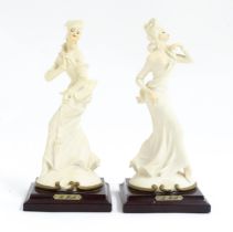 A pair of Italian figural modelled as ladies, designed by B. Merli. Approx. 8 3/4" high (2) Please