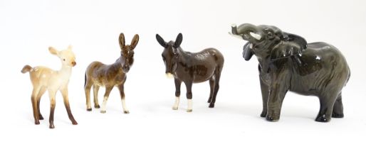 Four Beswick models of animals comprising elephant model no. 974, a fawn no. 1000B, a donkey no.