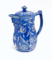 A 19thC Spode coffee pot with relief mask detail to spout with hand painted floral and bird
